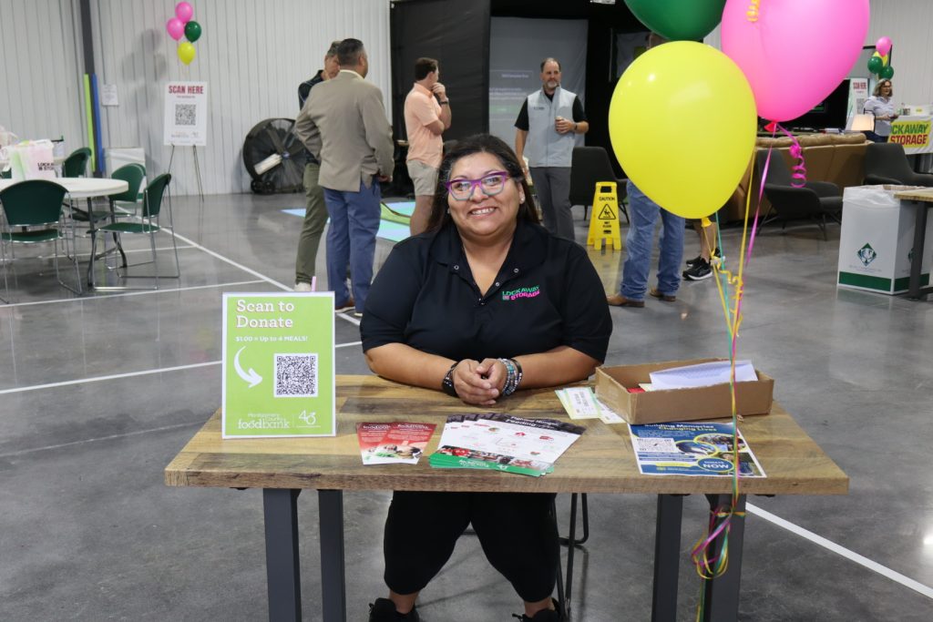 Strat Property Management team member Dorothy at the 2025 Conroe community event