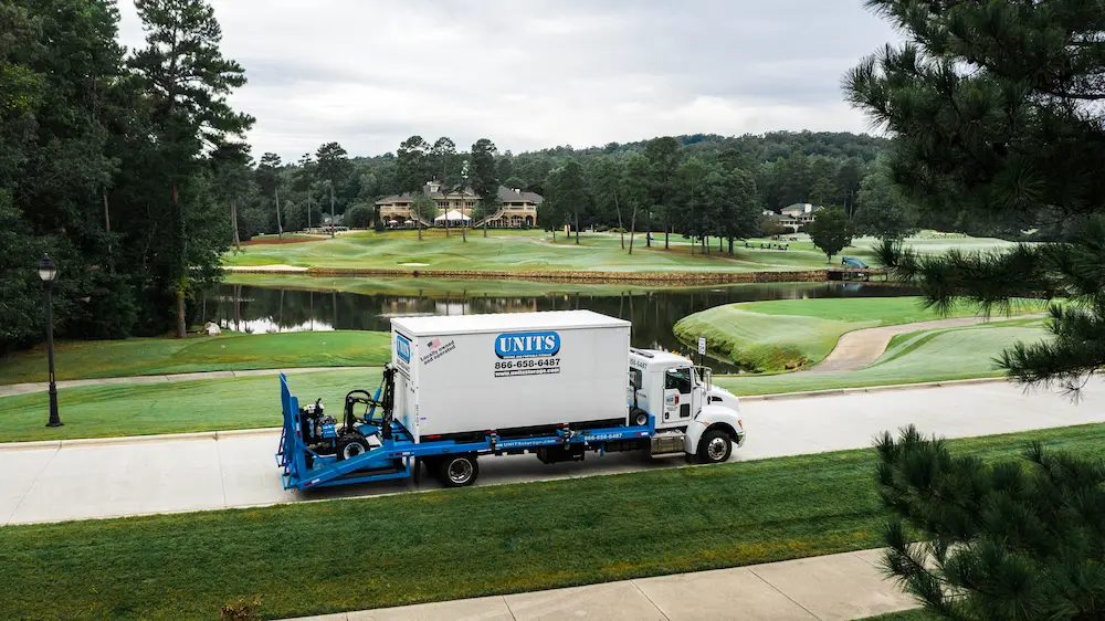 Units Portable Storage Drone Shot of Truck Carrying Storage Container